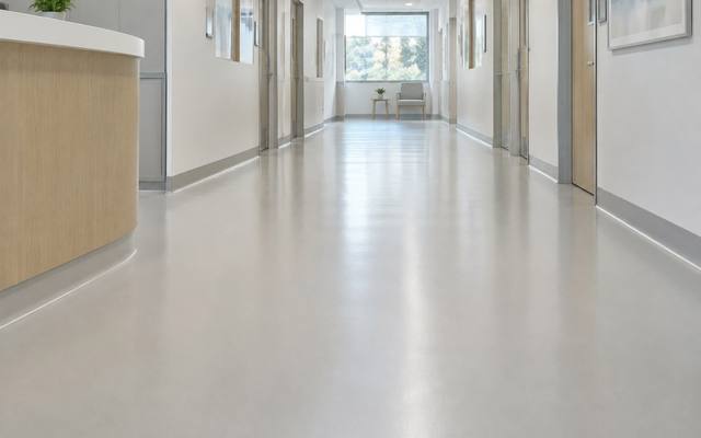 Seamless light floor down a clinic corridor in Clarington