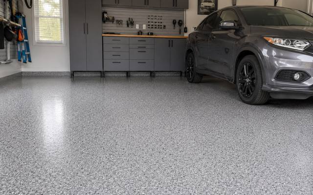 Grey flake garage floor with wall storage in Clarington